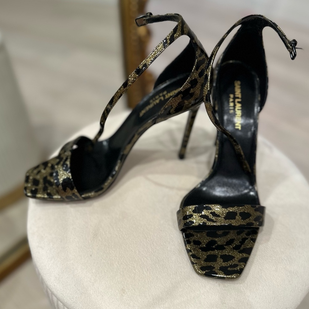 YSL heels! Only worn once! Patent leather . Sexy! Comes w box and duster bag!